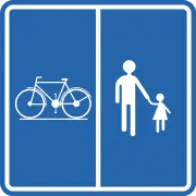 Chemin ou partie de la voie publique réservé à la circulation des piétons, cyclistes, cavaliers et conducteurs de speed pedelecs avec l’indication de la partie du chemin qui est affectée aux différentes catégories d’usagers.